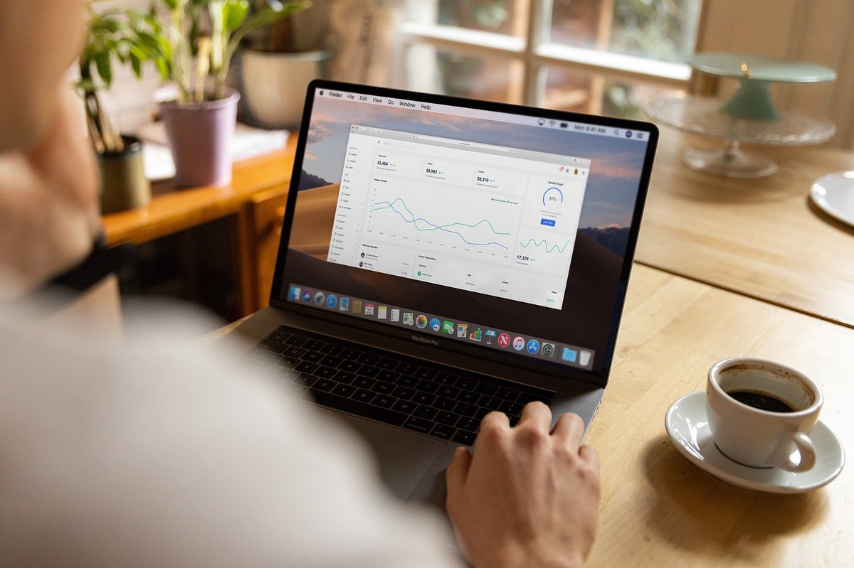 Remote worker using a laptop in a home office setting, representing the digital nomad lifestyle in Thailand supported by the digital nomad visa